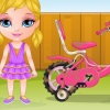 Apprendre  faire du vlo  un bb qui vient d'avoir un tricycle